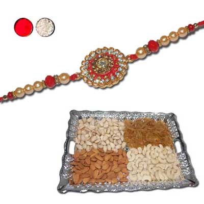 "Zardosi Ganesh Rakhi - ZR-5540 A Dry fruit Thali-RD600 - Click here to View more details about this Product